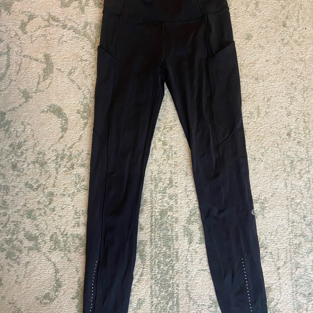 Lululemon HR fast and free 25” with Side Pockets size 4